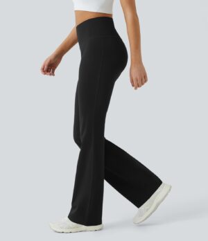Leggings lisos de tiro alto ligeramente acampanados con bolsillos