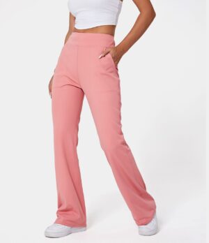 Leggings acampanados de tiro alto con bolsillos