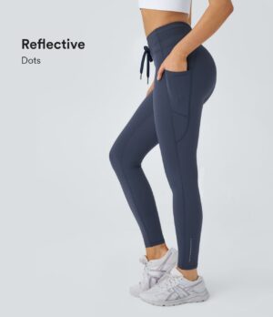 Leggings UltraSculpt™ 7/8 correr bolsillo lateral cordón tiro alto reflectante canalé